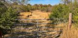 6.49 acres Choke Canyon Estates Live Oak County Three Rivers Texas gate