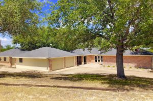 county home for sale on acreage in Live Oak County