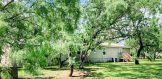 102 Christian Dr., George West Texas real estate home on 1 acre modular Back yard 1